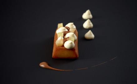 Baba au Calvados, pommes confites, praliné, ganache montée à la Manzana