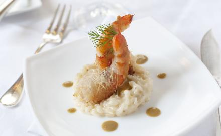 Risotto acidulé, crevettes croustillantes et crème d'étrilles