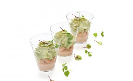 Avocado and prawn in a glass with cocktail sauce