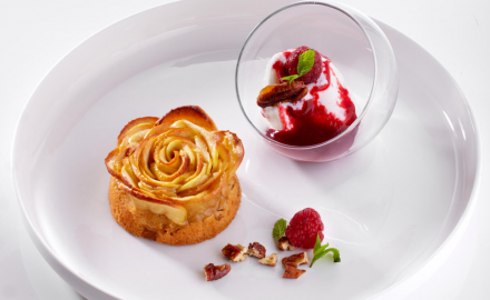 Apple, pecan and wild pepper tartlet with fior di latte sour taste ice cream and a raspberry coulis